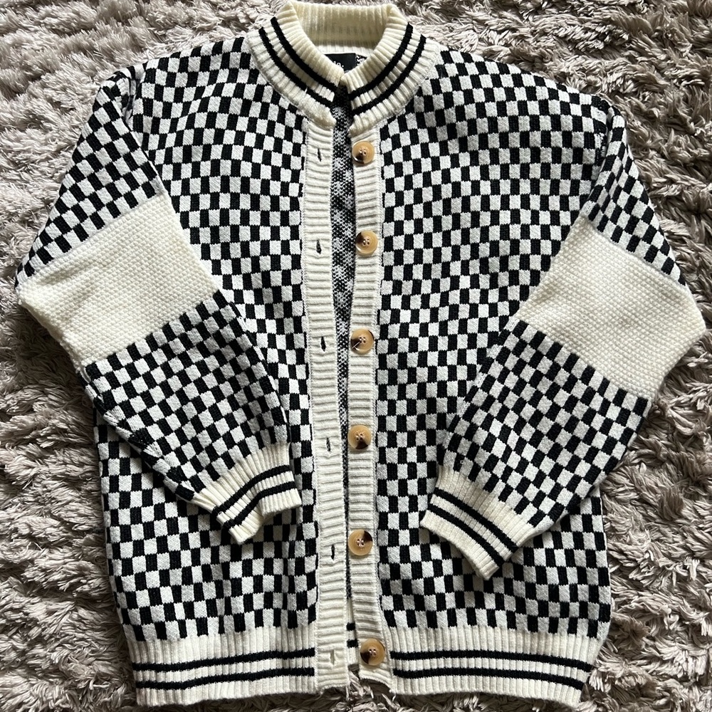 Dressed in lala checkered sweater! Only worn once!